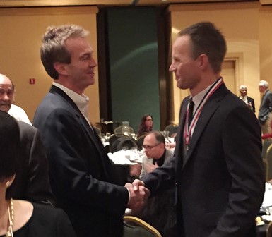 Stan Hogrebe and Dr. Thomas Hainschwang at the Accredited Gemologist Association gala and award ceremony